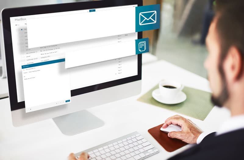 man using computer that has microsoft office solutions